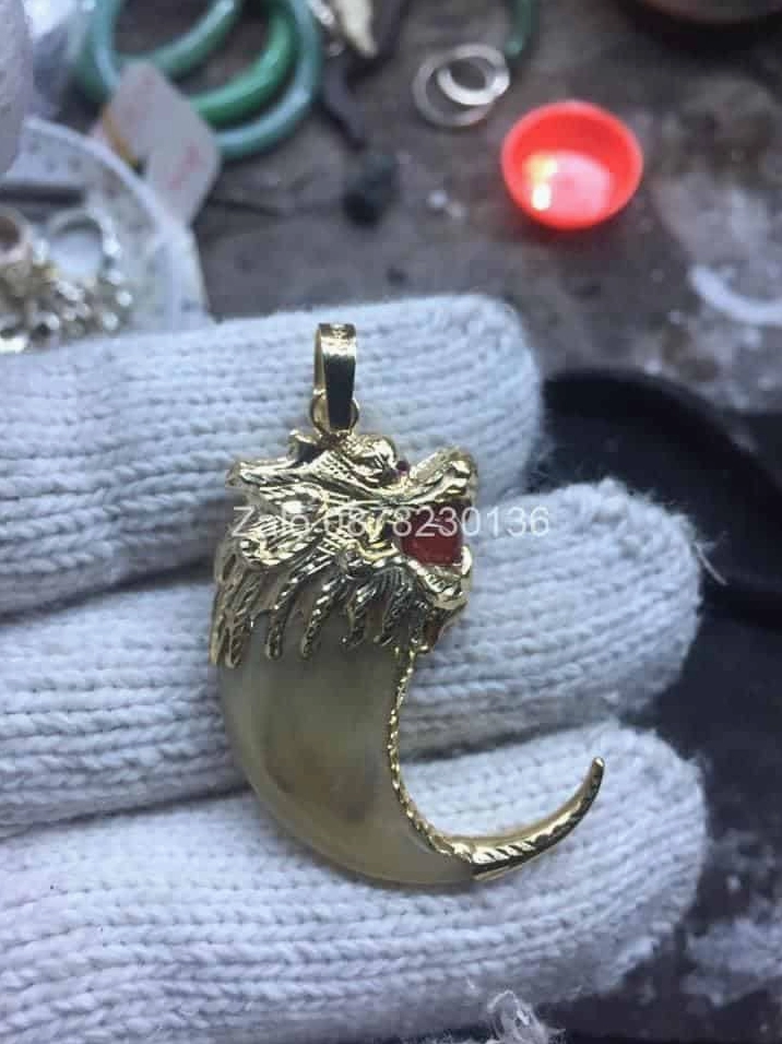 móng cọp bọc vàng 10kara đầu rồng ngậm ngọc